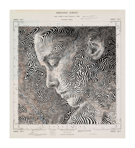 "Fountains Earth, United Kingdom" - a portrait of a man emerging from an abstract pattern drawn onto a black and white topographic map of the Fountains Earth area in Yorkshire by artist Ed Fairburn.