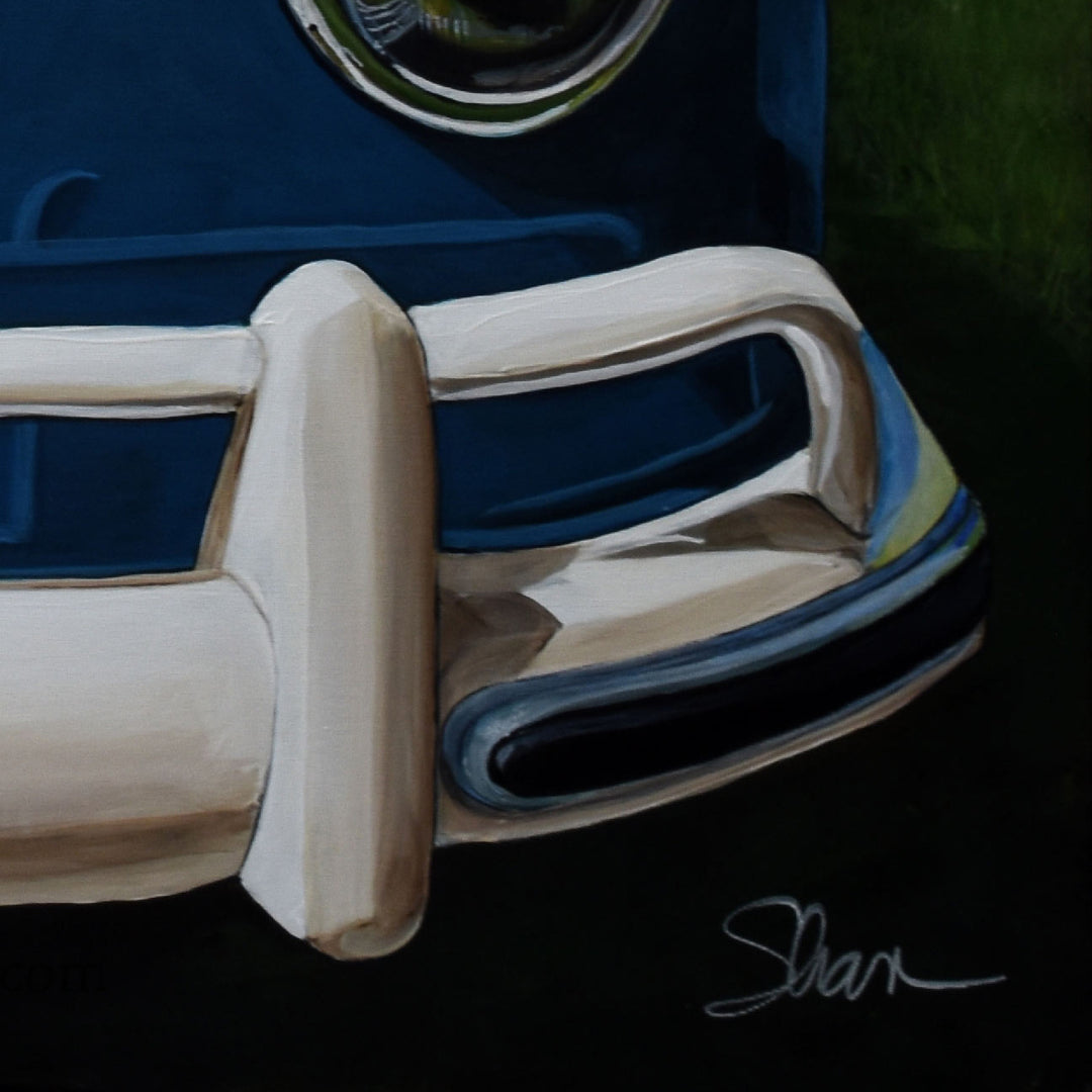Shan Fannin | '1967 Volkswagen Samba/Kombi Bus' | 28 x 28\" depicts a detailed close-up of the vintage blue VW Kombi’s front bumper and headlight, making bold wall art. Signed by Shan in the lower right corner.