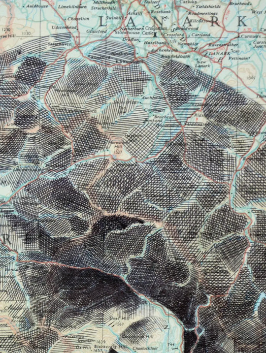A close up of an Ed Fairburn | "Lanarkshire" map with black and white lines.