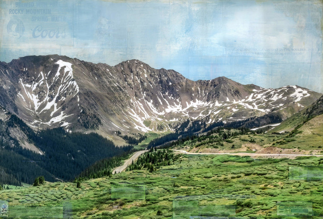 A mixed media painting inspired by Loveland Pass, featuring a majestic mountain range with a winding road in the background, created by JC Spock - "Through Loveland Pass".