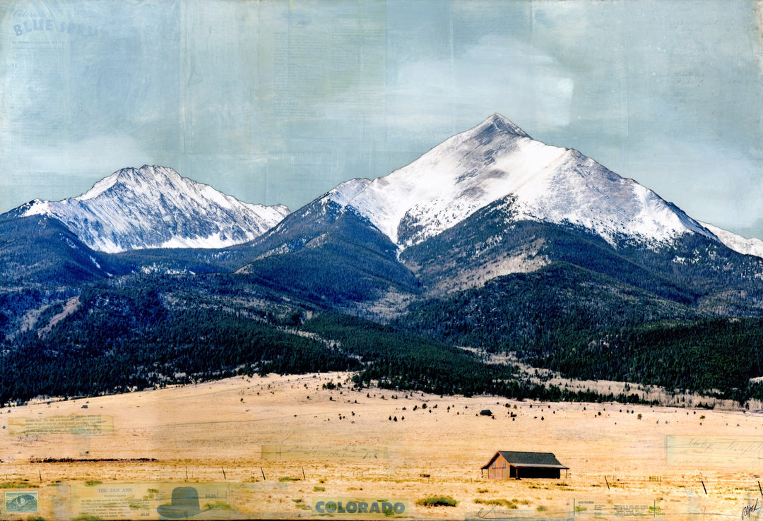 A "Lonely View" of a mountain range with a house in the background, captured by JC Spock using mixed media.