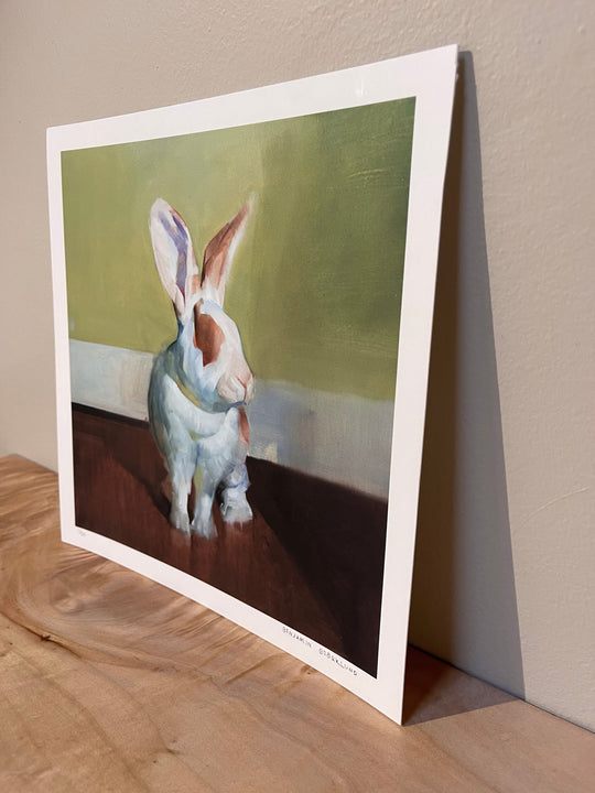 A Benjamin Björklund | "Gwyneth" painting of a rabbit sitting on a table.